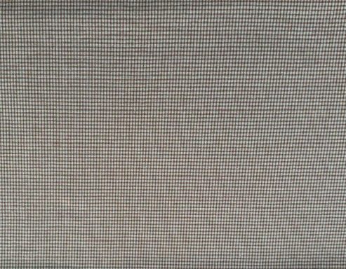 Textura de superficie gris clara con líneas sutiles y patrones en relieve.